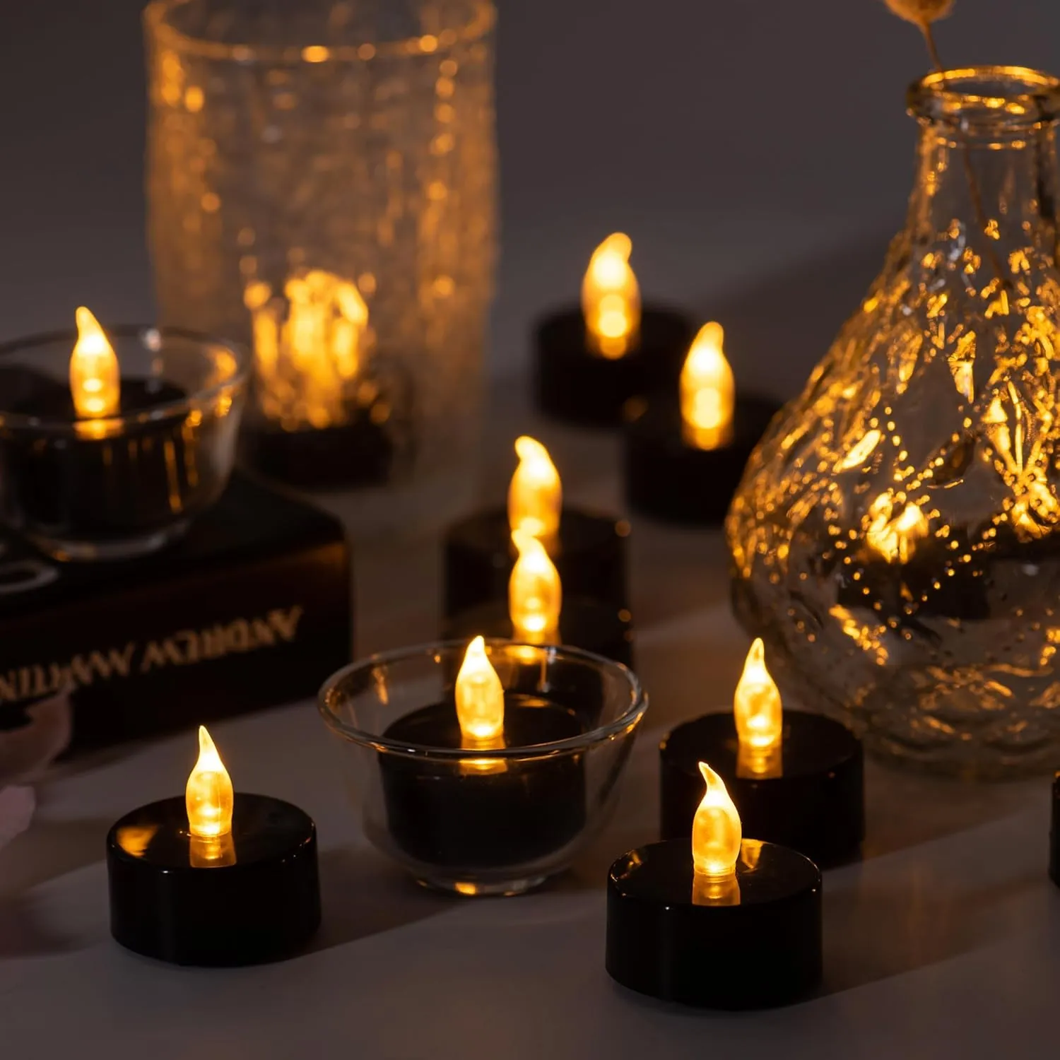 Lasts 2X Longer Black Flameless Tealight Candles, 100 Pack, Batteries Included, Realistic Tea Lights Candles, Flickering Bright Tealights, Battery Operated Candles for Halloween Decorations